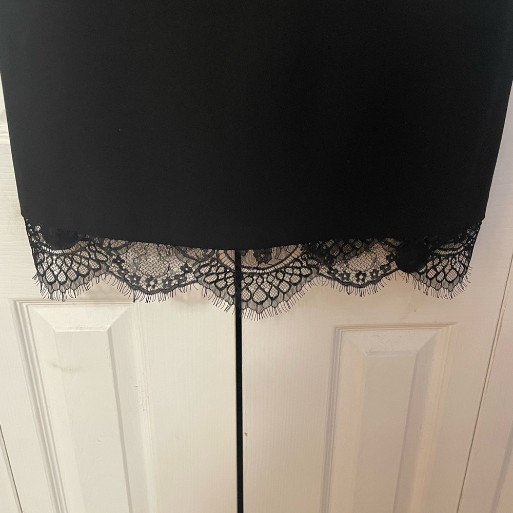 Black Betsey Johnson dress with lace on sleeves and bottom